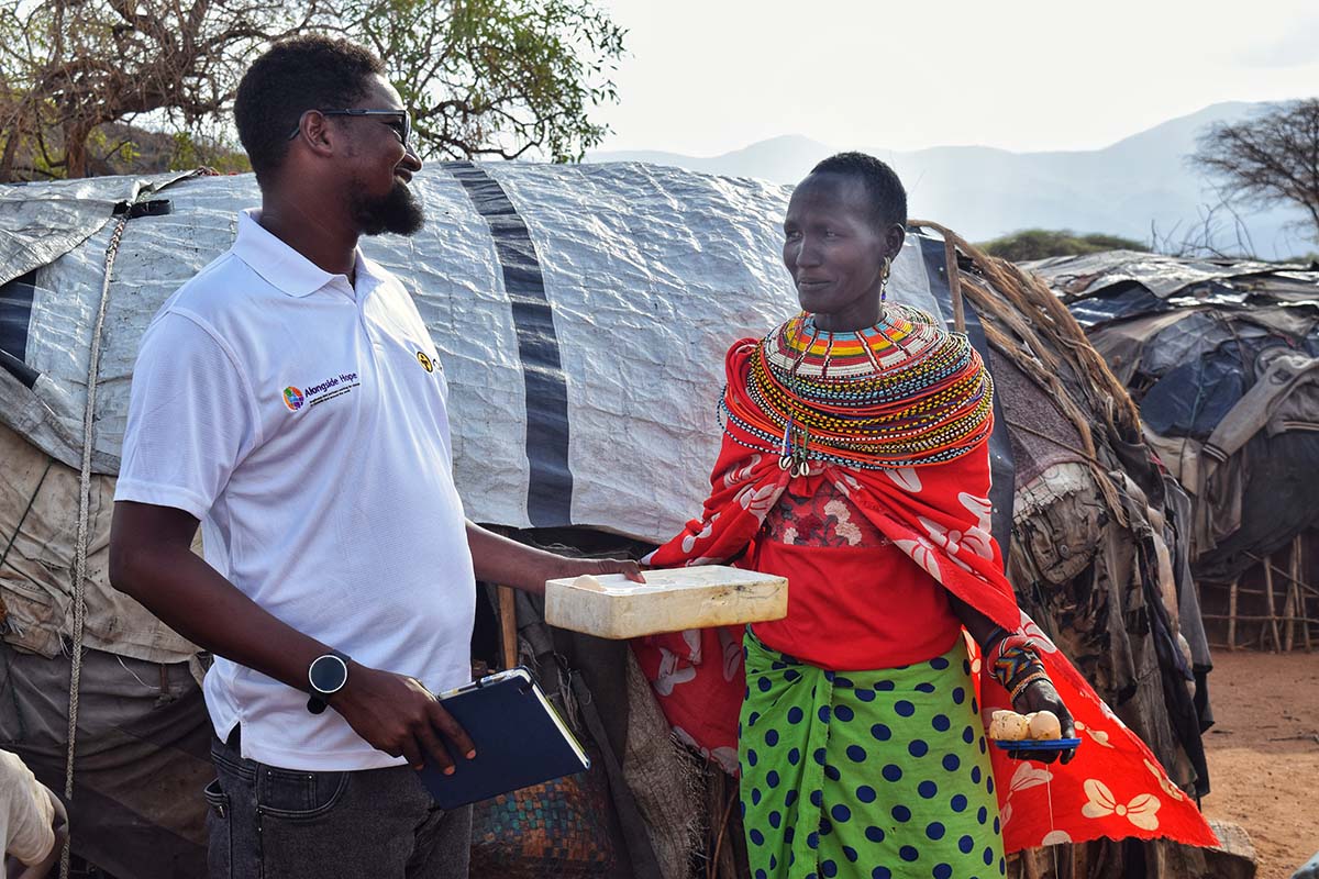 Kenya, Marsabit, chicken farmer